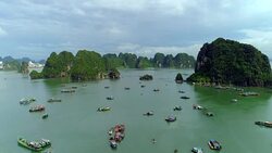 4k Aerial Over boats docked in bay with karst mountains. Ha long bay. Halong City. Stock Footage