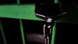 Slow Motion: Shackle hook stuck in the dark jail Stock Footage