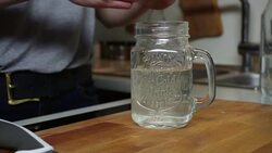 Young woman pouring lemonade Stock Footage