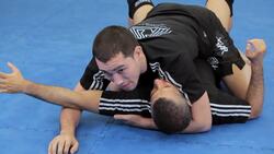How to Do an Arm Triangle Choke from Mount MMA Submission Instructional Video