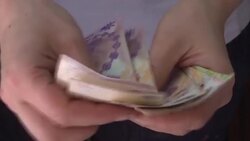 CLEAN : STOCKSHOTS: Argentina tenders bonds to ease exchange rate pressure News Clip