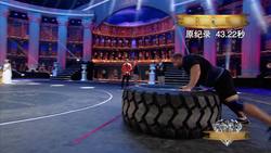 Cape-Wearing Gladiators Flip Massive Tire Instructional Video