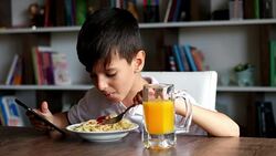 Boy eating spaghetti Stock Footage