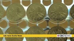 Christmas tree made of gold coins News Clip