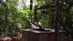 Old Wooden Water Well Panning Video Stock Footage