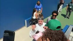 #TheMoment a baby in a helmet became a sensation at the U.S. Open News Clip