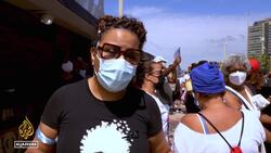 A Congolese refugee was killed in Rio, Brazilians take to the streets to protest the brutal killing News Clip