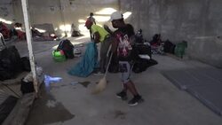 CLEAN : Migrants leave camp on US-Mexico border and relocate to shelter News Clip