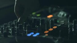 Music DJ playing set and using mixer tool Stock Footage