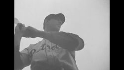Close shots of Detroit Tigers players posing at bat for photo opportunities during 1945 World Series in US News Clip