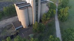 Gottened towers of an old coal mine in Tokod, Hungary Stock Footage