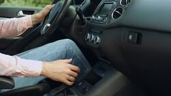 Driver shifting gear stick before driving car Stock Footage