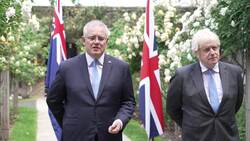 Boris Johnson and Scott Morrison hold Downing Street press conference News Clip