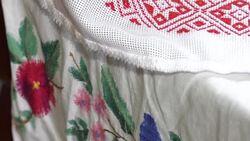 National red and white embroidery. The process of decorating decorative towels embroidered red ornament. Stock Footage