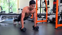 Young Asian handsome man doing exercises in gym Stock Footage