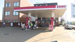 Worker disinfecting fuel pumps during coronavirus lockdown News Clip