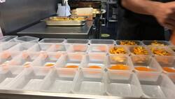 Community members prepare free school lunches for children in Bristol News Clip