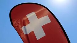 Swiss Banner Flag with Sunlight Stock Footage