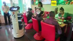 Robot waiter becomes a star attraction at Havana restaurant News Clip