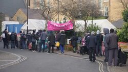 People queuing to food bank in Islington News Clip