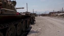 Syrian forces in badly damaged village near Hama Instructional Video