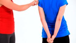 How to Do the Clasp Hand Behind Back Prenatal Yoga Pose Instructional Video