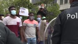 CLEAN : Dozens of Cameroonians demonstrate outside EU summit News Clip