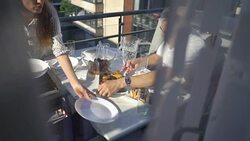 Family dinner on the balcony of the apartment Stock Footage