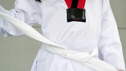 Day in the Life of a Child : Little asian child in fighting action,Asian girl practice taekwondo,Asian taekwondo girl Stock Footage