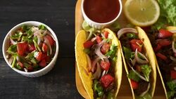 tacos with meat and vegetables - Mexican food Stock Footage