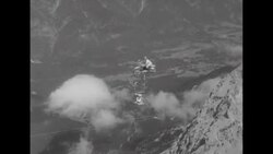 Father-and-son team doing stunts on tightrope at Garmisch-Partenkirchen ski resort on Mount Zugspitze in Alps in Germany News Clip