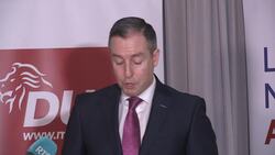 Emotion in Paul Givan's voice as he announces resignation News Clip