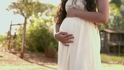 Cute pregnant on natural background. Stock Footage