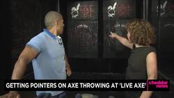 Getting Points on Axe Throwing at 'Live Axe' in Soho News Clip