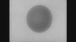 1950s: Illustrated representation of an atom Stock Footage