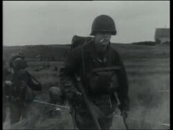 Allied troops clear mines and advance through hedgerows. German POWs and Allied casualties. Normandy 1944. Stock Footage