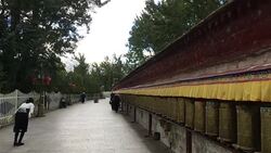 Prayers spinning the prayer wheels. Stock Footage