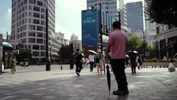 Shanghai's Street Corner Stock Salon Shows Casino Energy News Clip