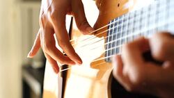 Musician playing classic guitar Stock Footage
