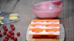 Making French raspberry mousse cake. Home confectionery. Stock Footage
