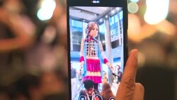 CLEAN : Puppet of young Syrian refugee girl reaches Marseille in cross-Europe journey News Clip