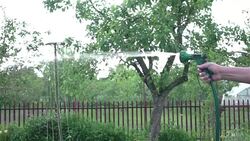 Watering vegetable garden in slow motion 250fps Stock Footage