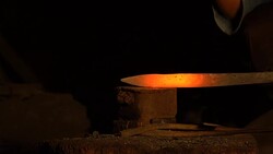 Hot metal workpiece for the manufacture of clad steel on the anvil Stock Footage