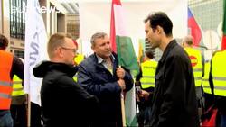 Transport companies hold protest in Brussels against French law News Clip