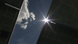 Solar panels at a solar farm News Clip