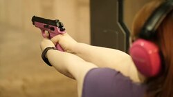 Slow motion target shooting on a firing range News Clip