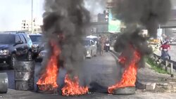 CLEAN : Demonstrators block Lebanon highway after the death of a protester News Clip