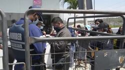 CLEAN : Relatives of Ecuador inmates wait at morgue for news after prison riot News Clip