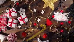 Christmas decoration and gifts on old wooden floor Stock Footage
