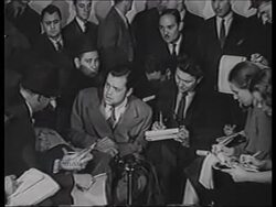Orson Welles interviewed by the press after his controversial radio broadcast of 'War of the Worlds' in October 1938 Stock Footage